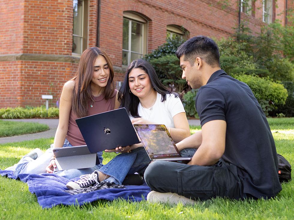 SPU students work on their laptops in Tiffany Loop